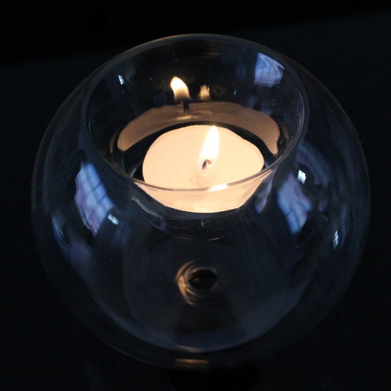 Bougeoir en verre transparent en forme de boule