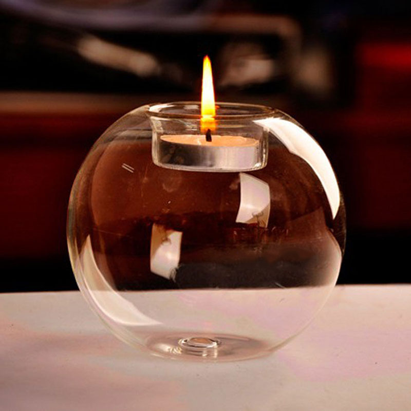Bougeoir en verre transparent en forme de boule