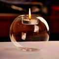 Bougeoir en verre transparent en forme de boule