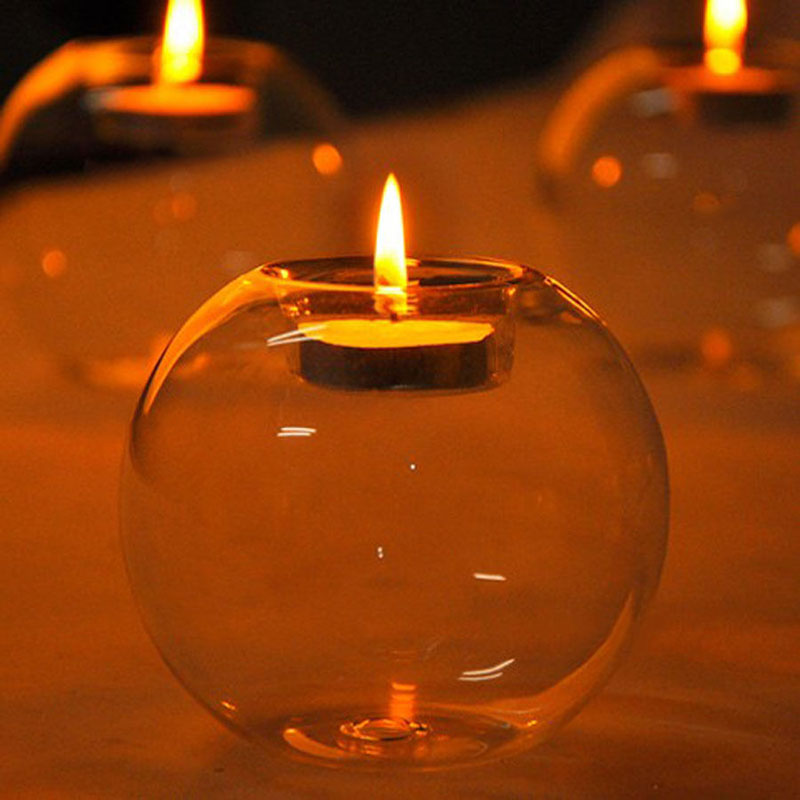 Bougeoir en verre transparent en forme de boule